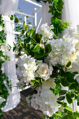 Obraz na płótnie Canvas Luxury elegant beautiful wedding summer decoration with flowers outdoor, vertical.
