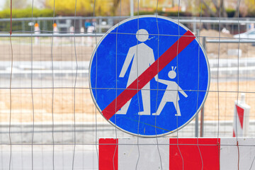 No pedestrian crossing allowed traffic sign on the street during road maintenance project