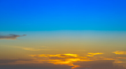Sunset sunrise over Patong Beach Phuket Thailand clear blue and turquoise waters and lovely blue skies sun setting over the horizon of Andaman sea 
