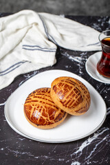 Pastry on dark background. Local name sade pogaca