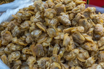 Close-up on dried clams in a local super market downtown Beihai, Guangxi province.