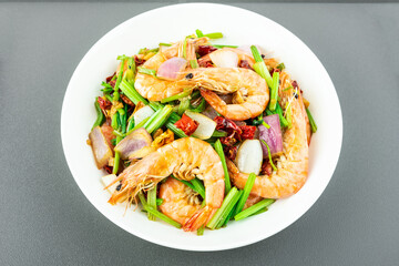 A dish of home-cooked celery fried shrimp