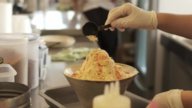 Process of Making Strawberry Bingsoo or Bingsu which made of crushed ice
