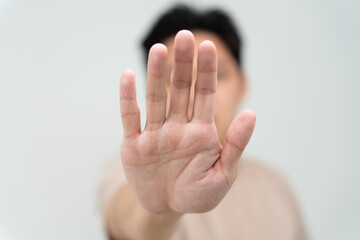hand showing stop, insult. Pressure, sexism. Racism, stop violence expression with negative, stop taboo sign, rejecting, declining something, campaign against violence against women and children..