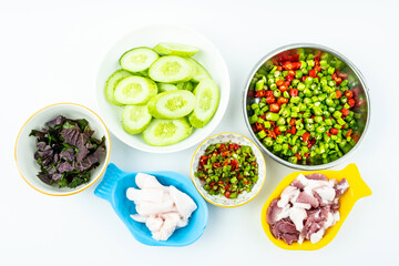 Sliced pork vegetable ingredients on white background
