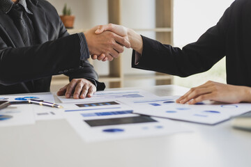 Handshake, Businessman shaking hands in a meeting and teamwork concept in business cooperation.