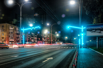 Modern traffic light semaphore in night city
