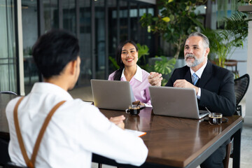 Young man employee during job interview at office workplace