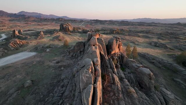 Mountains of Bayanaul National Park in the rosy gleams of the evening. Kazakhstan.