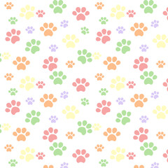 Fototapeta na wymiar Colorful Animal Paw Prints Pattern. Pastel Colored Cute Pet Paws Background Texture
