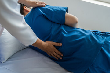 Checking back pain, Physiotherapy specialists help patients in physiotherapy. about Muscle Weakness and Fatigue