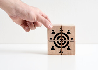 Teamwork, team effort and cooperation. Gathering the team around a common business goal. Working towards the common goal.