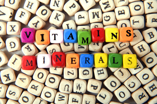 close up of the letters vitamins and minerals