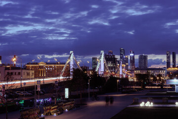 Night view of the Moscow city from the embankment of the river