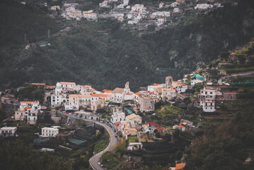 Fototapeta na wymiar Small town in mountains seen from Ravello on Amalfi coast in Italy
