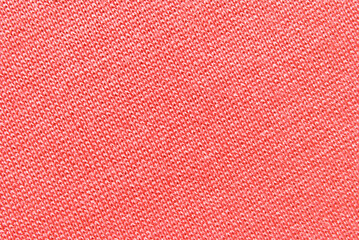 Jersey fabric texture, a surface of pink color jersey fabric texture as background
