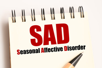 Seasonal affective disorder (SAD) words in notebook.