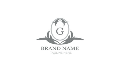 Design template of an elegant floral monogram for one or two letters, for example G. Wedding monogram. Business sign, identity monogram for restaurant, boutique, hotel, heraldry, jewelry.