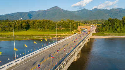 Cement bridge over Omkoi river in Northern Thailand. Cement bridge is very stronger for transportation, travel and development.