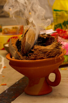 Unidentified hindu priests chants prayer on the occasion of Swaraswati pujathe goddess of education.