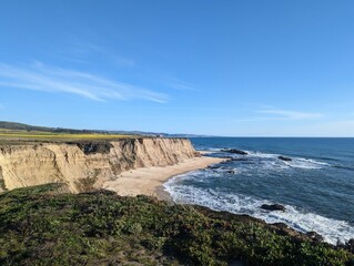 view of the coastal cliffs over the Pacific Ocean in Half Moon Bay, California