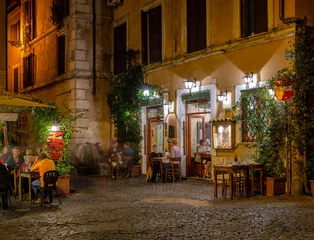 Fotobehang Night cozy old street in Trastevere in Rome, Italy. Trastevere is rione of Rome, on west bank of Tiber in Rome. Architecture and landmark of Rome © Ekaterina Belova