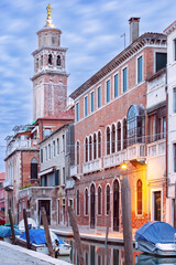 Traditional Venetian houses along the canal at sunrise.