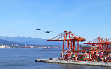 Port of Vancouver, Container Terminal with Gantry Cranes. Canada. Helicopters Overhead
