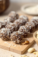 Energy balls. No cook energy protein, bites made from coconut flakes, oats, dried fruits and nuts.