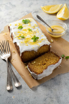Lemon drizzle loaf cake, homemade sponge soft cake with sugar icing