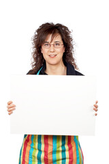 Housewife in apron holding the blank poster on white background