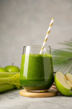 Fresh green smoothie. Apple, banana and spinach detox smoothie shake drink