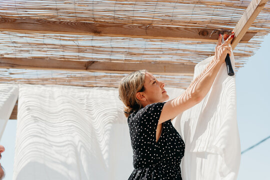 woman  preparing terrace for the summer