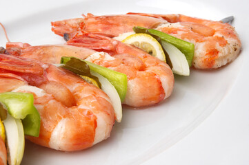 large juicy boiled shrimps served on plate