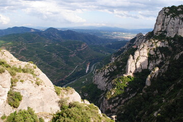 Fototapeta na wymiar The blue sky and The green mountains of Spain