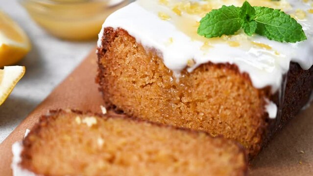 Lemon drizzle loaf cake, homemade sponge soft cake with sugar icing