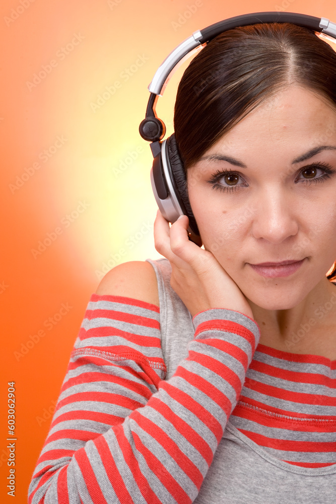 Poster attractive brunette woman with headphones