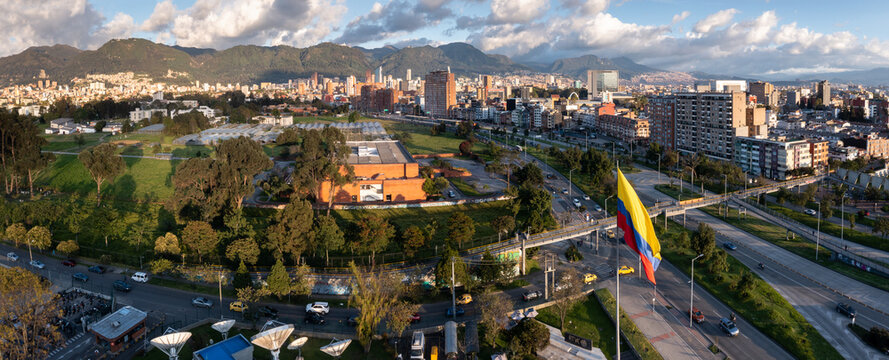 Panoramic Photo From A Drone Of A Green Field Area Of The National University With A Colombian Flag And Avenues On The Side In The Late Afternoon. Bogota Colombia. May 5, 2023.