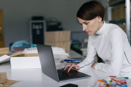 Dressmaker small business laptop textile workplace