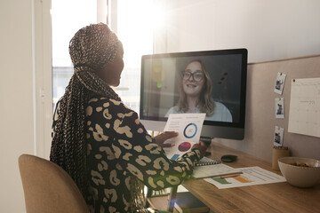 Female client having personal online consultation