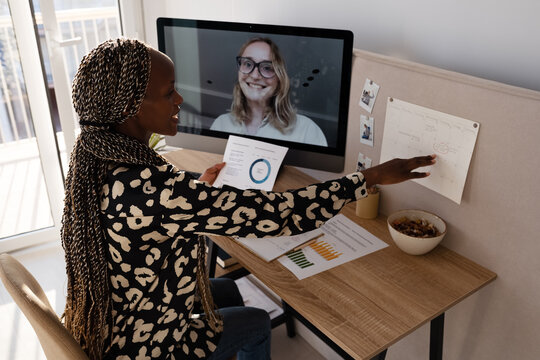 Black analyst checking schedule during remote work