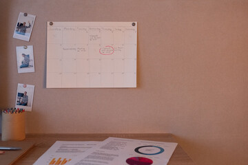 Work planner hanging on pin board