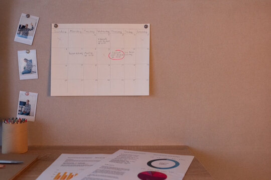 Work planner hanging on pin board