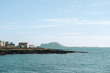 Seongsan Ilchulbong and Udo island Hawoomokdong Port seascape in Jeju island, Korea