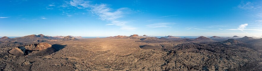 Fototapeta na wymiar Panoramic drone picture over the barren volcanic Timanfaya National Park on Lanzarote
