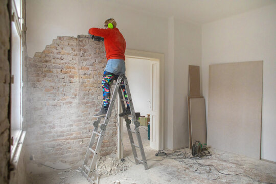 A woman is renovating her home