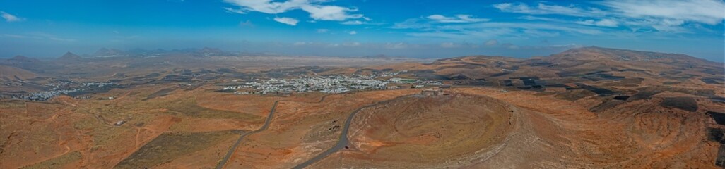 Drone panoramic view over Teguise town on Lanzarote from Santa Barbara Castle