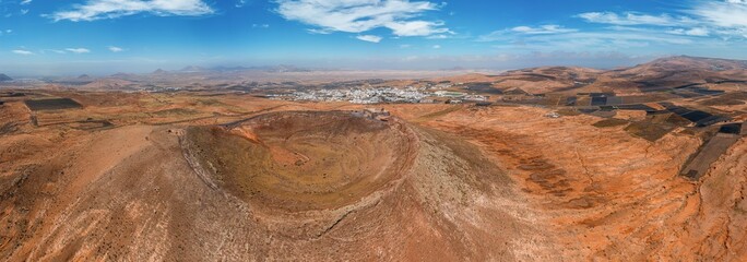 Drone panoramic view over Teguise town on Lanzarote from Santa Barbara Castle