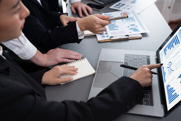 Closeup business team of financial data analysis meeting with business intelligence, report paper...