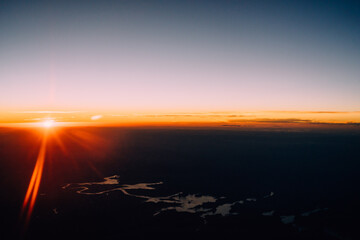 horizon at sunset out of a plane window